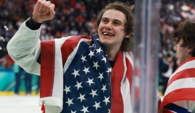Photographer describes capturing hockey star Jack Hughes' toothless grin after gold-medal win: "Still in shock"