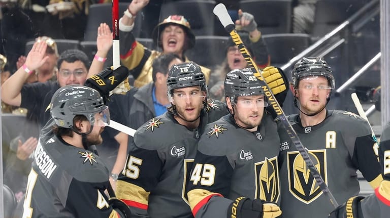 Vegas Golden Knights defenseman Rasmus Andersson (4), defenseman Noah Hanifin...