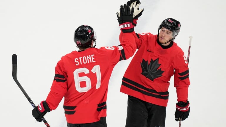 Canada's Mark Stone (61) celebrates after scoring a goal during...