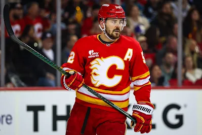 Calgary Flames defenseman Mackenzie Weegar skates during 2026 game.