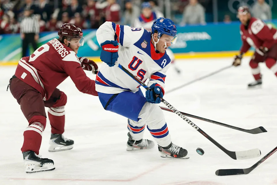 <p>Feb 12, 2026; Milan, Italy; Matthew Tkachuk of United States in action with Renars Krastenbergs of Latvia in men’s ice hockey group C play during the Milano Cortina 2026 Olympic Winter Games at Milano Santagiulia Ice Hockey Arena. Mandatory Credit: Geoff Burke-Imagn Images</p>
