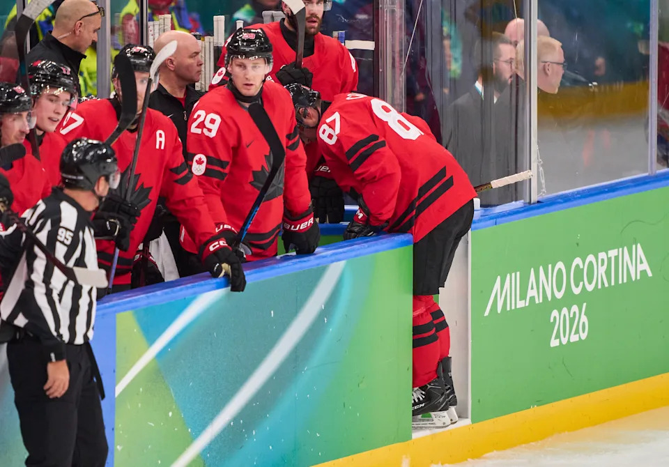 MILAN, ITALY - FEBRUARY 18: Sidney Crosby of Canada leaves the ice with an apparent injury following a check from Radko Gudas of Czechia during the Men's Ice Hockey Quarterfinal match between Canada and Czechia on day twelve of the Milano Cortina 2026 Winter Olympic games at Milano Santagiulia Ice Hockey Arena on February 18, 2026 in Milan, Italy. (Photo by EyesWideOpen/Getty Images)