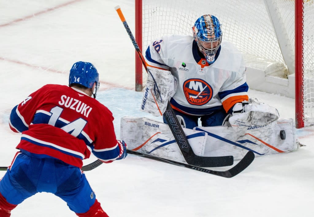 Ilya Sorokin makes a save on Nick Suzuki during second-period of the Islanders’ overtime road win over the Canadiens. AP