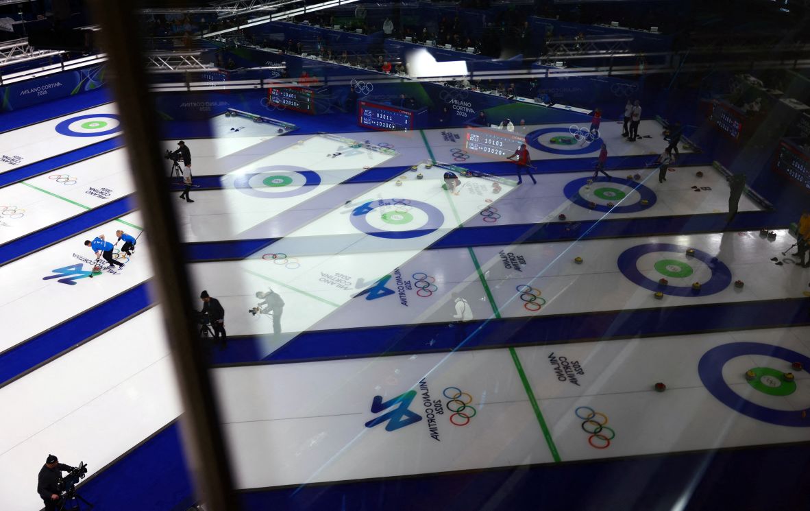 Curling teams compete in mixed-doubles action on February 5. Curling was the first sport to get underway at these Olympics.