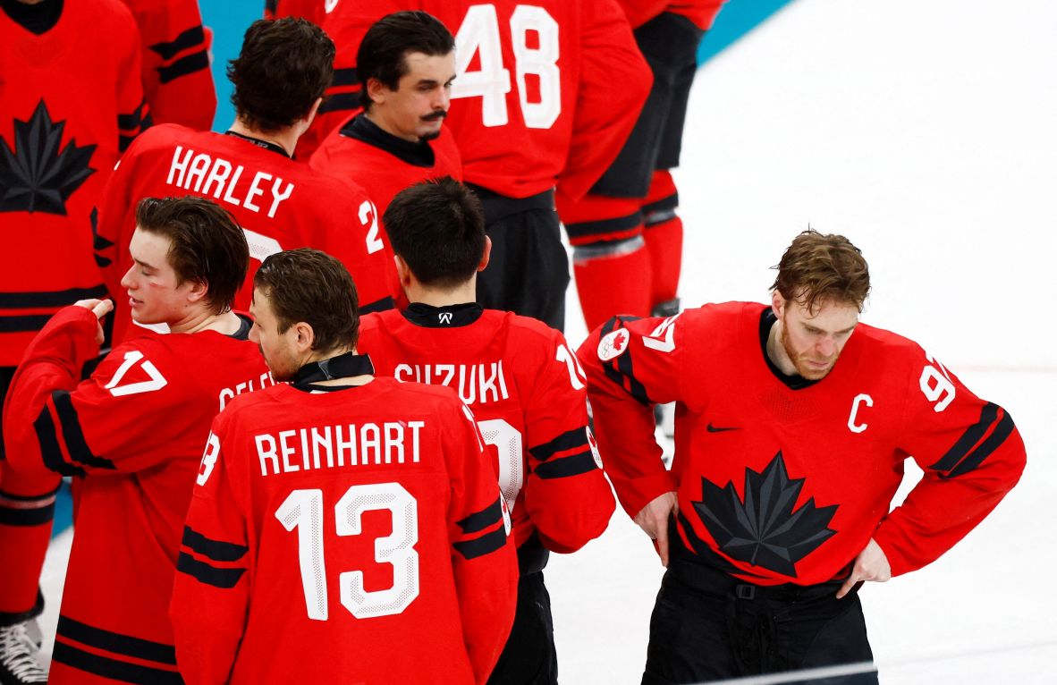 Canadian hockey players react after the crushing loss.
