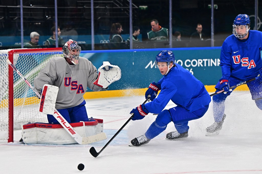 USA Men's Ice Hockey team members Matt Boldy and Jeremy Swayman training at Milano Santagiulia Ice Hockey Arena.