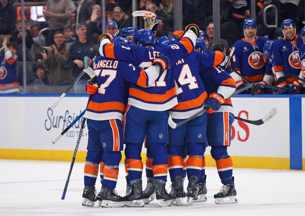 Matthew Schaefer #48 of the New York Islanders celebrated with his teammates after he scores a goal during the first period when the New York Islanders played the Pittsburgh Penguins Tuesday, February 3, 2026 at UBS Arena in Elmont, NY.