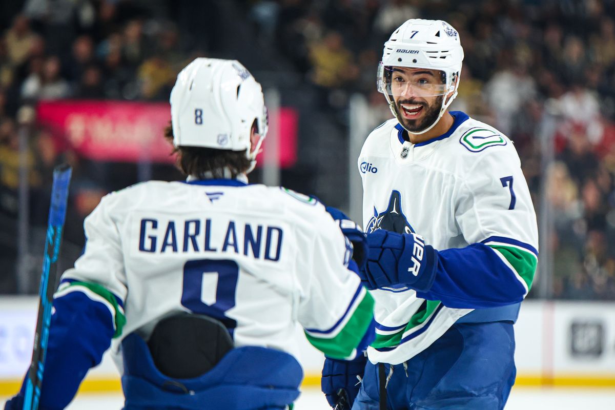Vancouver Canucks D Pierre-Olivier Joseph (7) smiles after scoring a goal against the Vegas Golden Knights on Wednesday February 4, 2026, in Las Vegas, Nevada. 