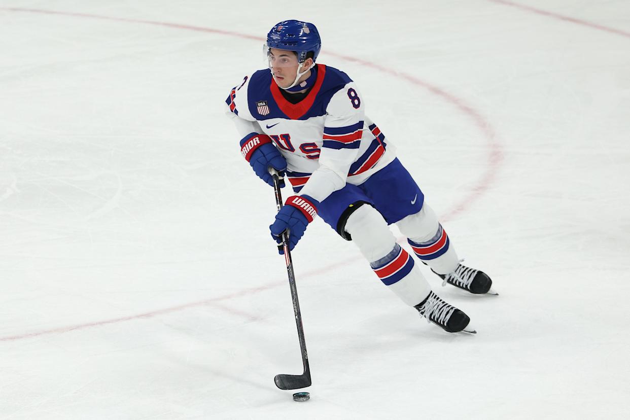 MILAN, ITALY - FEBRUARY 20: Zach Werenski #8 of Team United States skates with the puck in the first period during the Men's Semifinals Playoff match between the United States and Slovakia on day fourteen of the Milano Cortina 2026 Winter Olympic games at Milano Santagiulia Ice Hockey Arena on February 20, 2026 in Milan, Italy. (Photo by Jamie Squire/Getty Images)