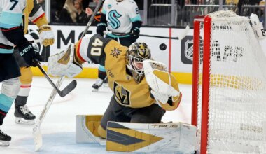 A puck shot by Seattle Kraken left wing Jared McCann (not shown) gets past Vegas Golden Knights ...