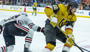 Golden Knights right wing Jonas Rondbjerg (46) takes the puck away from Chicago Blackhawks cent ...