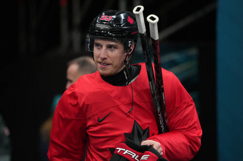 Canada's Mitch Marner arrives for men's ice hockey practice at the 2026 Winter Olympi ...