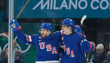 United States' Noah Hanifin, left, celebrates after scoring his side's fourth goal du ...