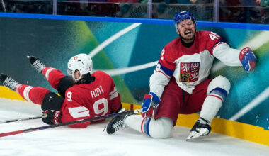 Czechia's Tomas Hertl (48) is challenged by Switzerland's Damien Riat (9) during a pr ...