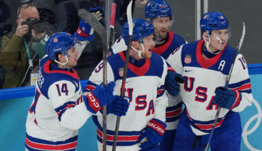 United States' Jack Eichel (9) celebrates with Brock Faber (14), Jaccob Slavin (74) and Ma ...