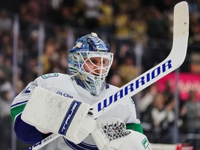 Kevin Lankinen takes a break during a stop in play in the second period