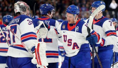 MILAN, ITALY - FEBRUARY 15: Connor Hellebuyck #37 and Matthew Tkachuk #19 of Team United States celebrate after the victory in the Men's Preliminary Group C match between the United States and Germany on day nine of the Milano Cortina 2026 Winter Olympic games at Milano Santagiulia Ice Hockey Arena on February 15, 2026 in Milan, Italy. (Photo by Gregory Shamus/Getty Images)