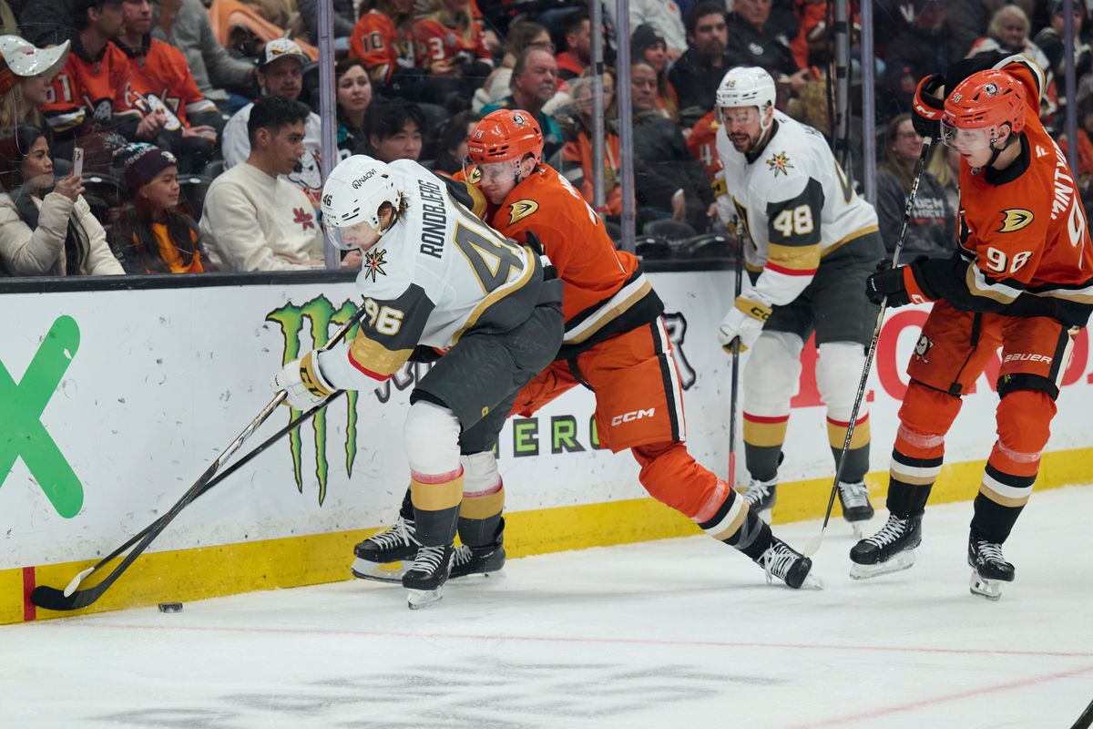 The Anaheim Ducks defender Ian Moore (74) fights for the puck against The Las Vegas Golden Knights February 1st, 2026 in Anaheim California. The Anaheim Ducks defender Ian Moore (74) fights for the puck against The Las Vegas Golden Knights February 1st, 2026 in Anaheim California.