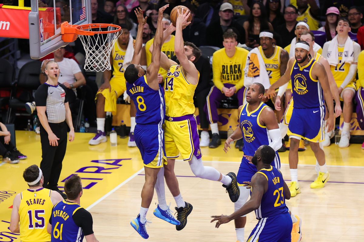 Los Angeles Lakers forward Maxi Kleber (14) shoots the basketball during an NBA game against the Golden State Warriors on February 7, 2025 in Los Angeles, CA.