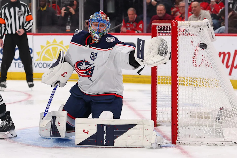 Feb 3, 2026; Newark, New Jersey, USA; Columbus Blue Jackets goaltender Elvis Merzlikins (90) defends his net against the New Jersey Devils during the second period at Prudential Center. Mandatory Credit: Ed Mulholland-Imagn Images