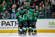 The Dallas Stars celebrate a goal by Dallas Stars center Oskar Bäck during the first period...