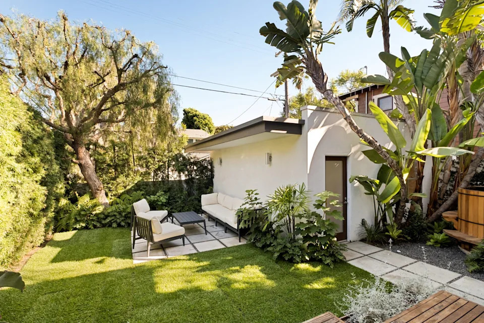 A cute deck overlooks the private patio and cedar hot tub. <span class="image-credit">(Engles Studios)</span>