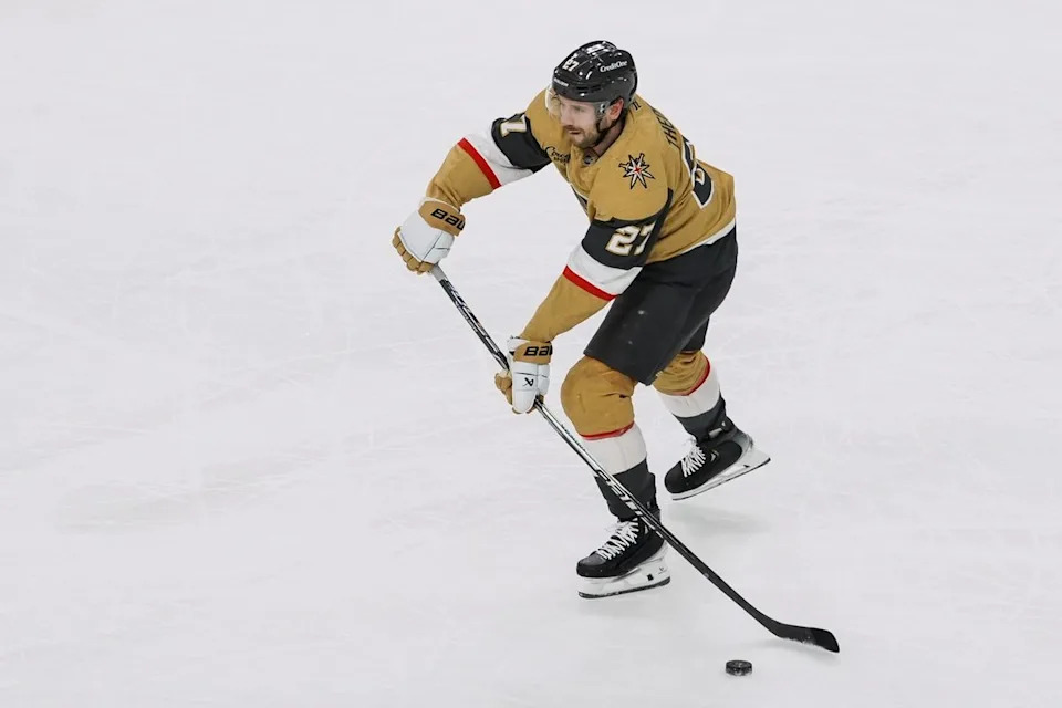 Golden Knights defenseman Shea Theodore (27) passes the puck down the ice during first period of NHL game against Dallas Stars on Thursday Jan. 29, 2026 at T-Mobile Arena in Las Vegas.