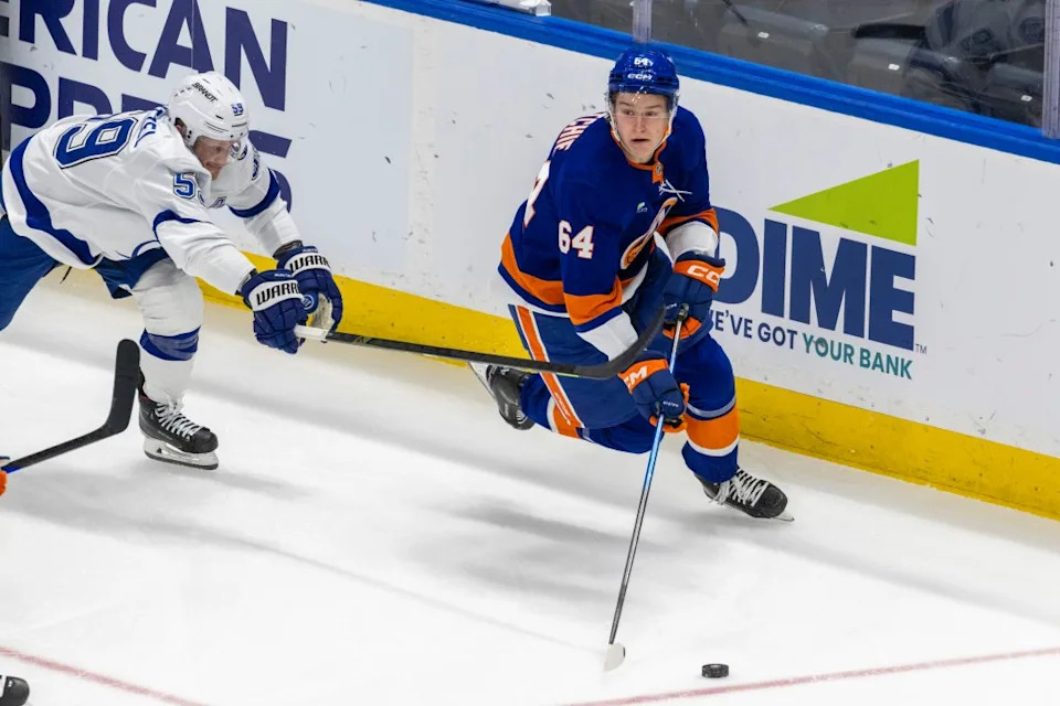 Calum Ritchie moves the puck down ice as Jake Guentzel defends during the third period of the Islanders’ 3-2 win over the Lightning at UBS Arena on Dec. 13, 2025. Corey Sipkin for the NY POST