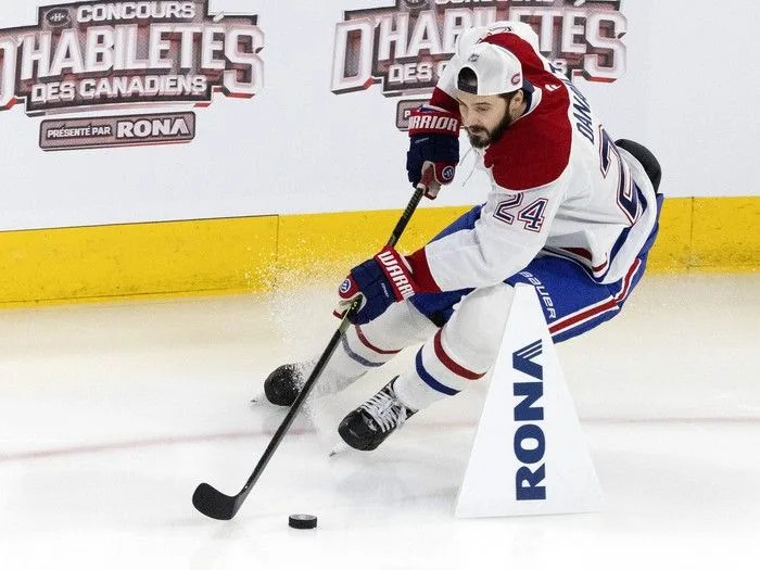  Montreal Canadiens centre Phillip Danault competes in the obstacle course during the team’s skills competition at the Bell Centre on Sunday, February 22, 2026.