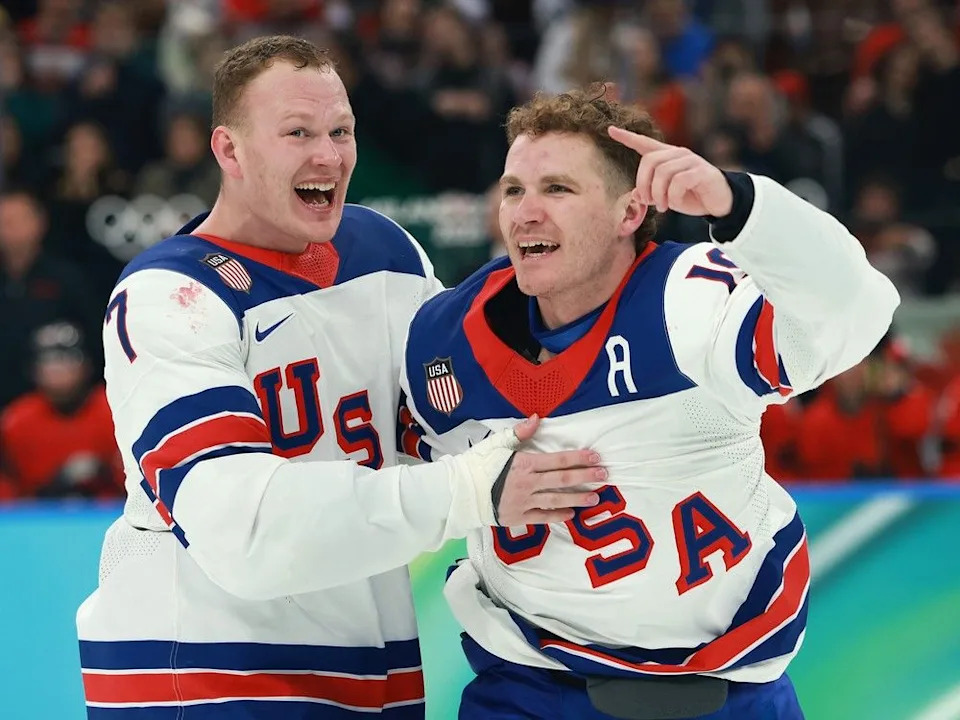 Brady Tkachuk and Matthew Tkachuk celebrate after Sunday’s win.