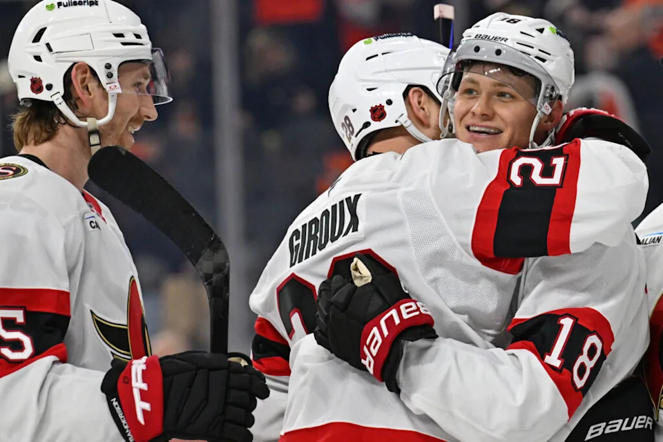 Feb 5, 2026; Philadelphia, Pennsylvania, USA; Ottawa Senators center Tim StŸtzle (18) celebrates his game-winning goal with right wing Claude Giroux (28) against the Philadelphia Flyers in overtime at Xfinity Mobile Arena. Mandatory Credit: Eric Hartline-Imagn Images