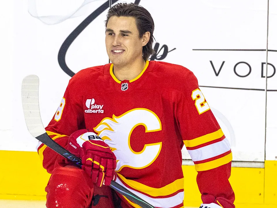  New Calgary Flames defenceman Zach Whitecloud takes part in warm-ups before NHL action against the New Jersey Devils at the Scotiabank Saddledome in Calgary on Monday, Jan. 19, 2026.