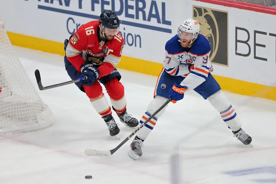 Connor McDavid (97) passes the puck away from Florida Panthers center Sasha Barkov (16) in Game 6 of the 2025 Stanley Cup Final. Credit&colon; Sam Navarro-Imagn Images