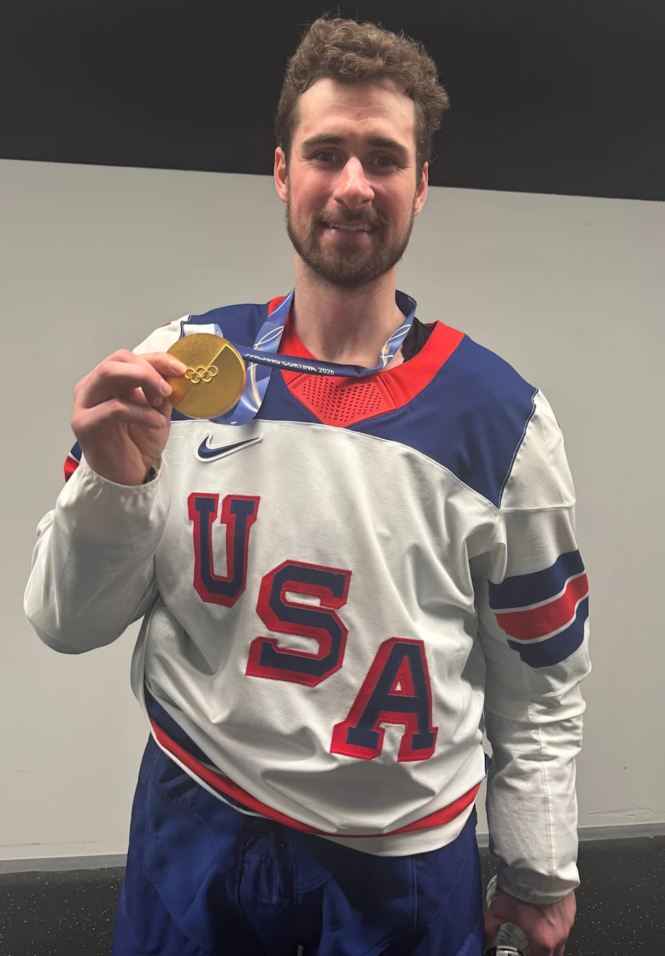 Detroit Red Wings captain Dylan Larkin with the gold medal he won on Feb. 22 at the 2026 Winter Olympics in Milan.