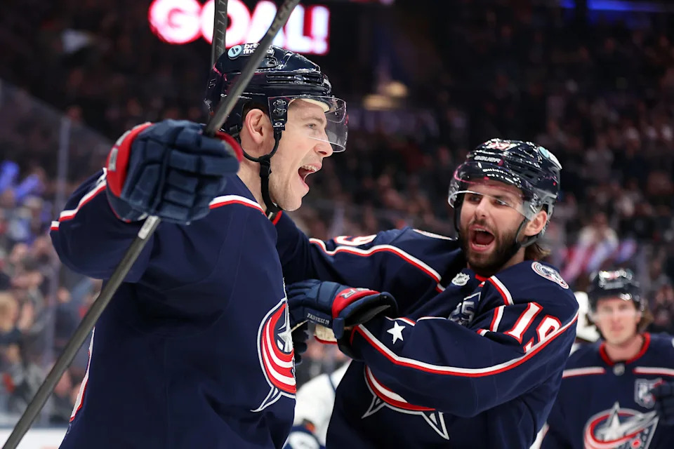 Jan 24, 2026; Columbus, Ohio, USA; Columbus Blue Jackets center Charlie Coyle (3) celebrates his goal with center Adam Fantilli (19) during the second period against the Tampa Bay Lightning at Nationwide Arena. Mandatory Credit: Joseph Maiorana-Imagn Images