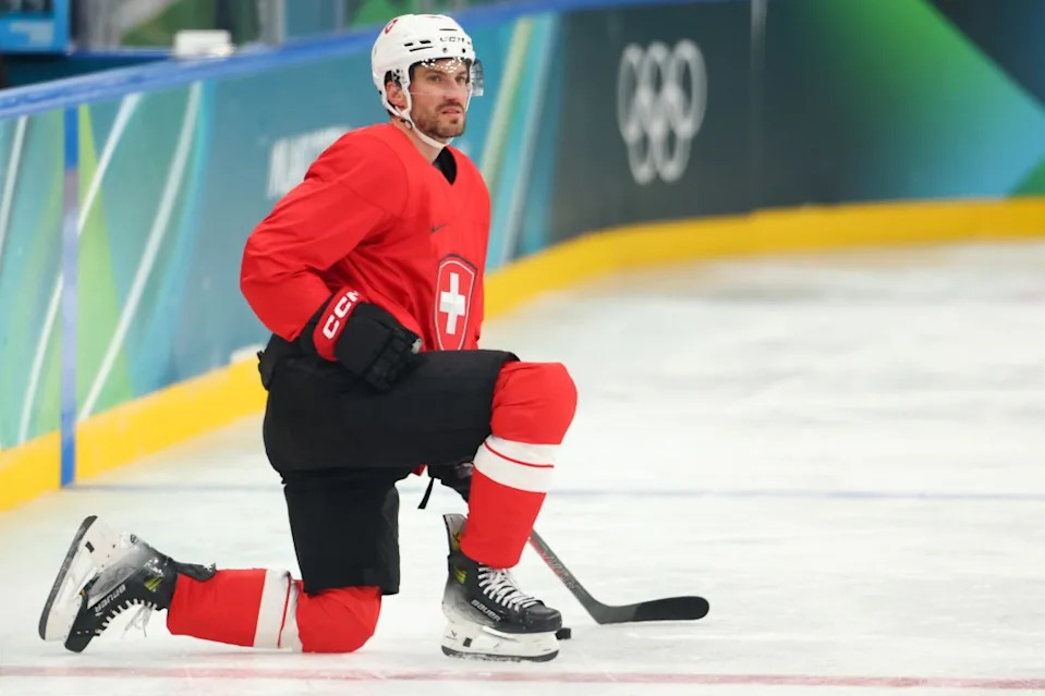 Roman Josi, who plays for the Predators in the NHL, takes a knee during Team Switzerland’s practice on Feb. 8, 2026. Getty Images