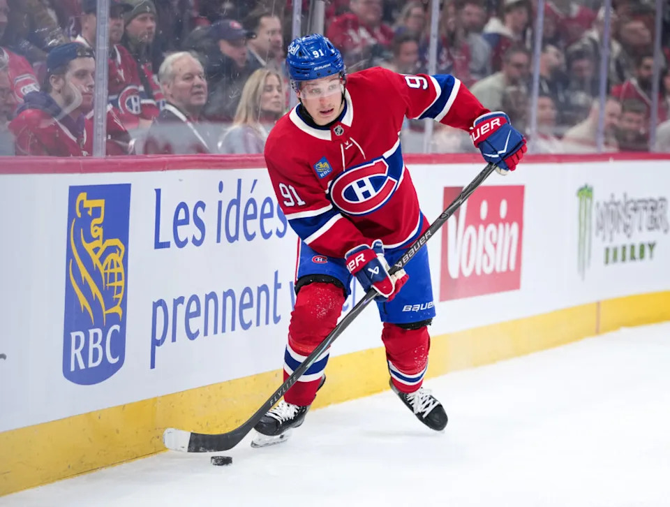 Jan 20, 2026; Montreal, Quebec, CAN; Montreal Canadiens forward Oliver Kapanen (91) plays the puck against the Minnesota Wild during the second period at the Bell Centre. Mandatory Credit: Eric Bolte-Imagn Images