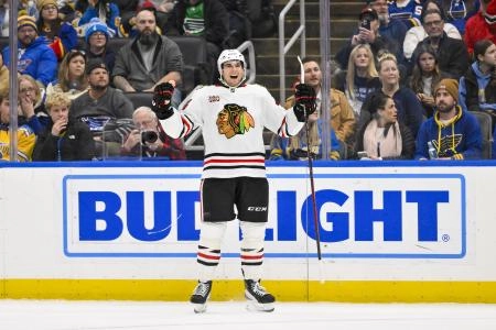 Dec 12, 2025; St. Louis, Missouri, USA; Chicago Blackhawks defenseman Wyatt Kaiser (44) reacts after scoring against the St. Louis Blues during the first period at Enterprise Center.