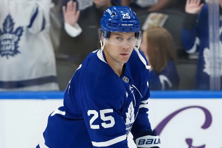 Oct 18, 2025; Toronto, Ontario, CAN; Toronto Maple Leafs defenseman Brandon Carlo (25) skates during the warmup before a game against the Seattle Kraken at Scotiabank Arena. Mandatory Credit: Nick Turchiaro-Imagn Images