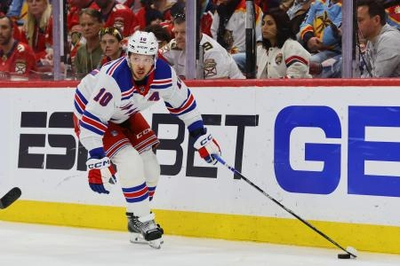 May 26, 2024; Sunrise, Florida, USA; New York Rangers left wing Artemi Panarin (10) moves the puck against the Florida Panthers during the second period in game three of the Eastern Conference Final of the 2024 Stanley Cup Playoffs at Amerant Bank Arena.