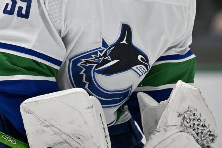 Dec 21, 2023; Dallas, Texas, USA; A view of the Vancouver Canucks logo on the jersey of goaltender Thatcher Demko (35) during the game between the Dallas Stars and the Vancouver Canucks at the American Airlines Center.