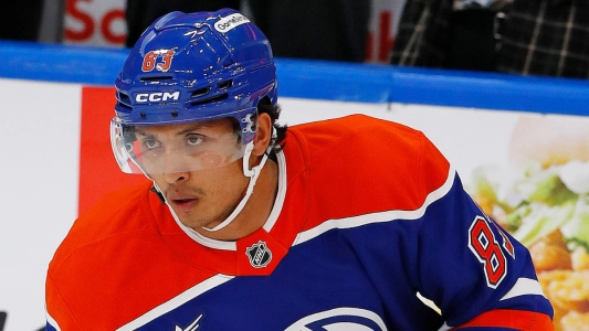 Sep 23, 2024; Edmonton, Alberta, CAN; Edmonton Oilers defensemen Alex Kannok-Leipert (83) skates during warmup against the Calgary Flames at Rogers Place.