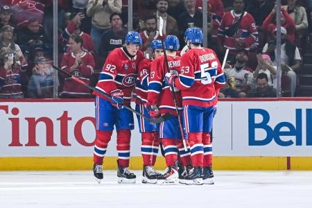 Sep 25, 2025; Montreal, Quebec, CAN; Montreal Canadiens right wing Patrik Laine (92) celebrates his goal against the Toronto Maple Leafs with his teammates during the second period at Bell Centre.