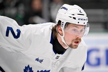 Dec 21, 2025; Dallas, Texas, USA; Toronto Maple Leafs defenseman Simon Benoit (2) looks on during the game at the American Airlines Center. Mandatory Credit: Jerome Miron-Imagn Images
