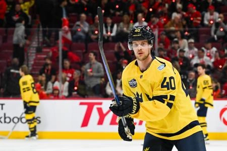 Feb 12, 2025; Montreal, Quebec, CAN; Team Sweden forward Elias Pettersson (40) looks on in warm-up before the game against Team Canada during a 4 Nations Face-Off ice hockey game at Bell Centre.