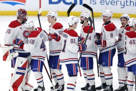 Feb 4, 2026; Winnipeg, Manitoba, CAN; Montreal Canadiens celebrate a victory against the Winnipeg Jets at Canada Life Centre.