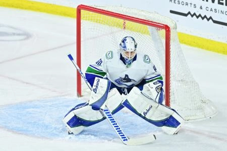 Apr 13, 2023; Tempe, Arizona, USA; Vancouver Canucks goaltender Collin Delia (60) defends in the first period against the Arizona Coyotes at Mullett Arena.