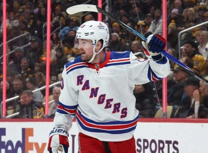 Jan 31, 2026; Pittsburgh, Pennsylvania, USA; New York Rangers left wing Alexis Lafreniere (13) celebrates his power play goal against the Pittsburgh Penguins during the second period at PPG Paints Arena.