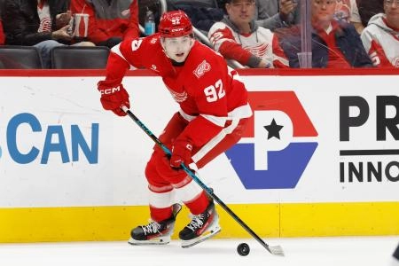 Jan 12, 2026; Detroit, Michigan, USA; Detroit Red Wings center Marco Kasper (92) skates with the puck in the second period against the Carolina Hurricanes at Little Caesars Arena.