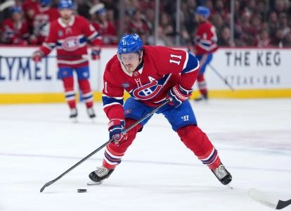 Jan 22, 2026; Montreal, Quebec, CAN; Montreal Canadiens forward Brendan Gallagher (11) plays the puck during the first period against the Buffalo Sabres at the Bell Centre.